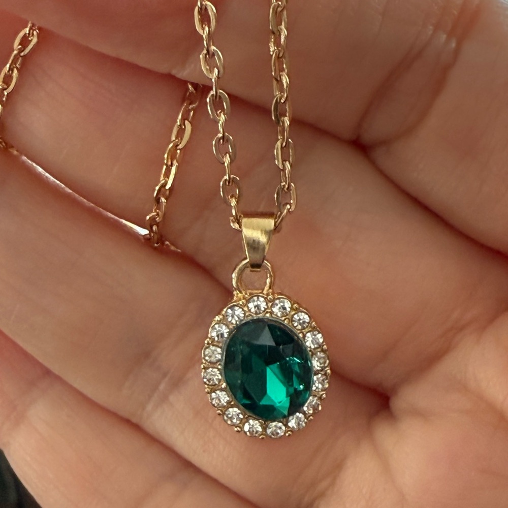 Imitation emerald and diamond rose gold tone pendant and chain